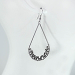 Oval Twisted Silver Earring with Silver Beads